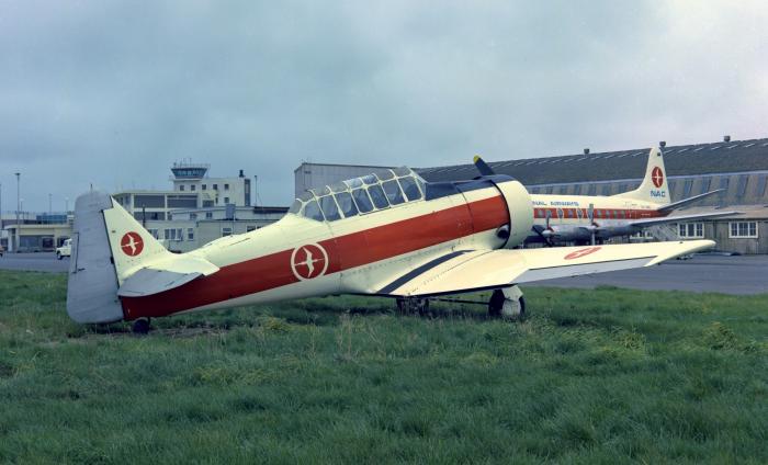 The Harvard in the colours of National Airways Corporation, which used it as an instructional airframe, at Harewood Airport.