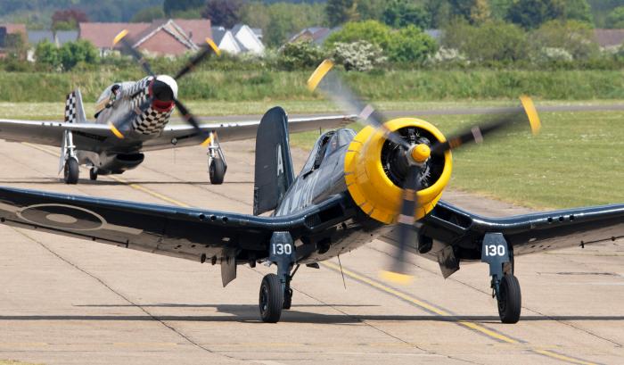 Father and son Brian and Nick Smith taxi out for a Flying Day performance with The Fighter Collection’s Corsair and the Anglia Aircraft Restorations TF-51D.